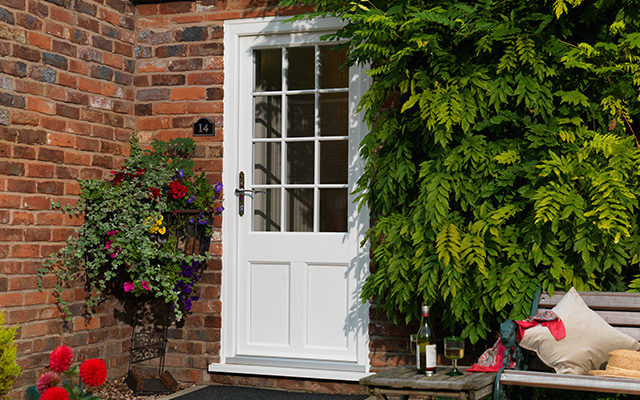 beautiful white door with georgian bar